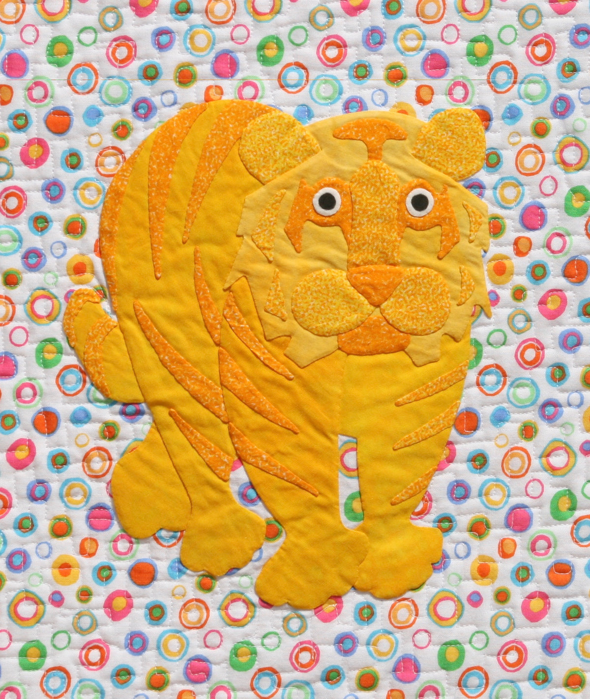 Yellow tiger on a colorful background fabric appliqué quilt pattern