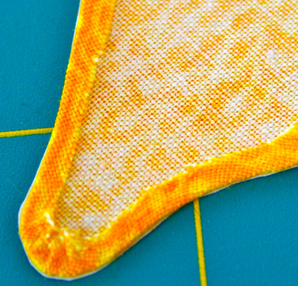 Close-up of a yellow and white textured object on a blue background a perfect turned edge