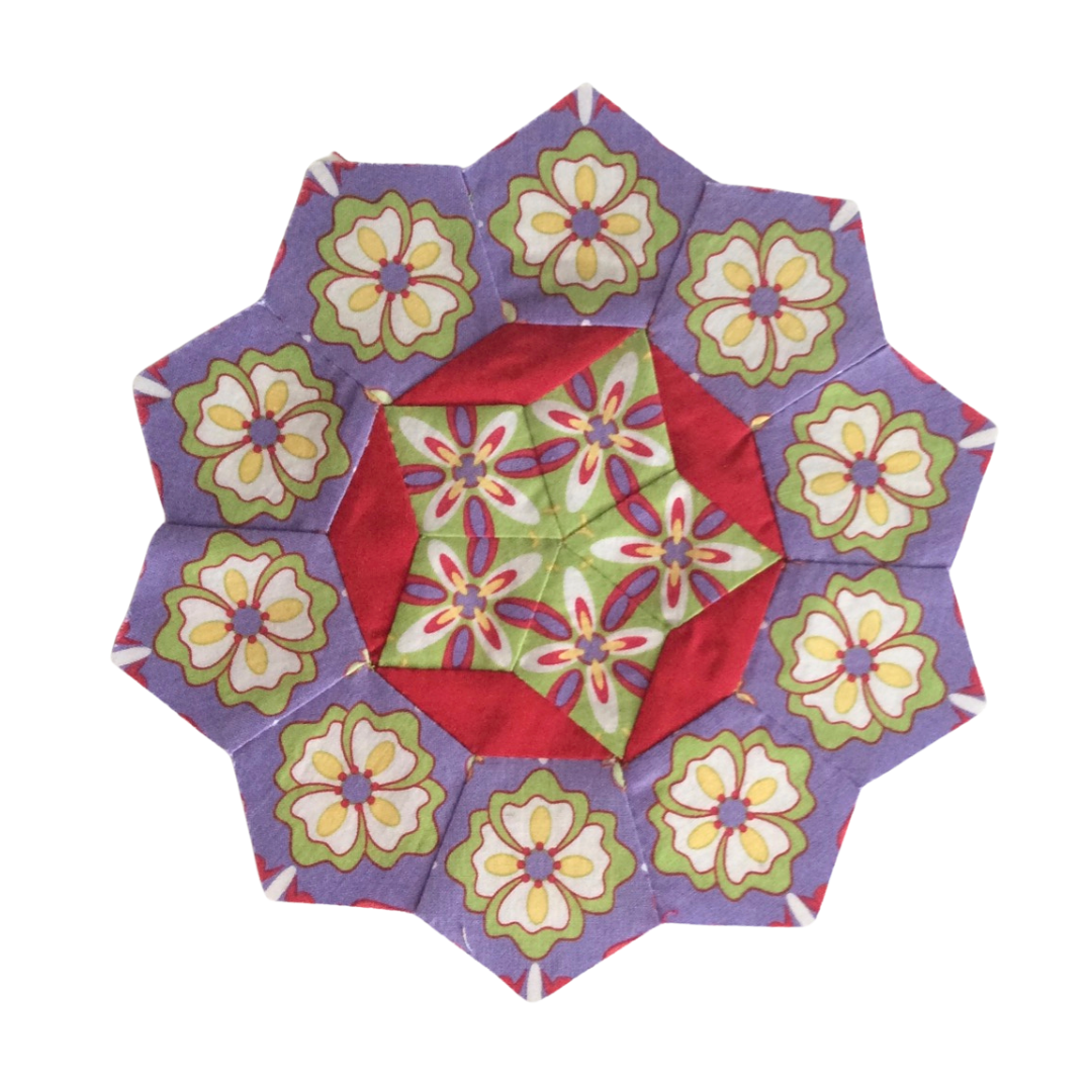 Purple and red rosette quilt block