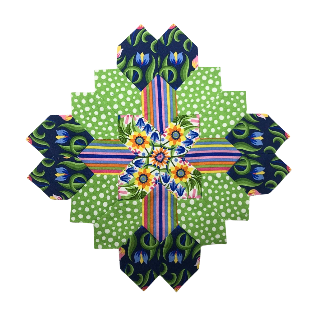 Lucy Boston quilt block made with English Paper Piecing Made Easy navy and green colors