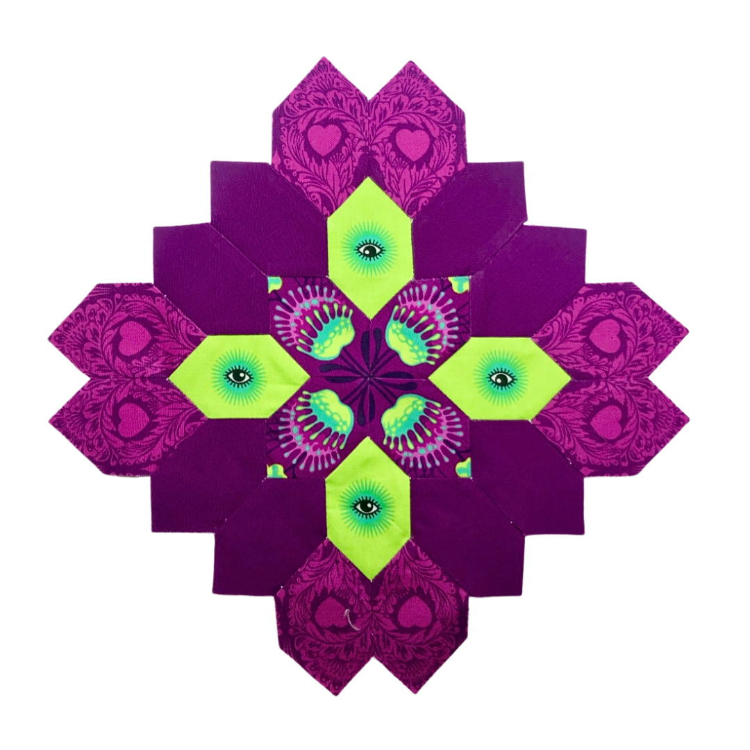 Lucy Boston quilt block made with English Paper Piecing Made Easy purple and green